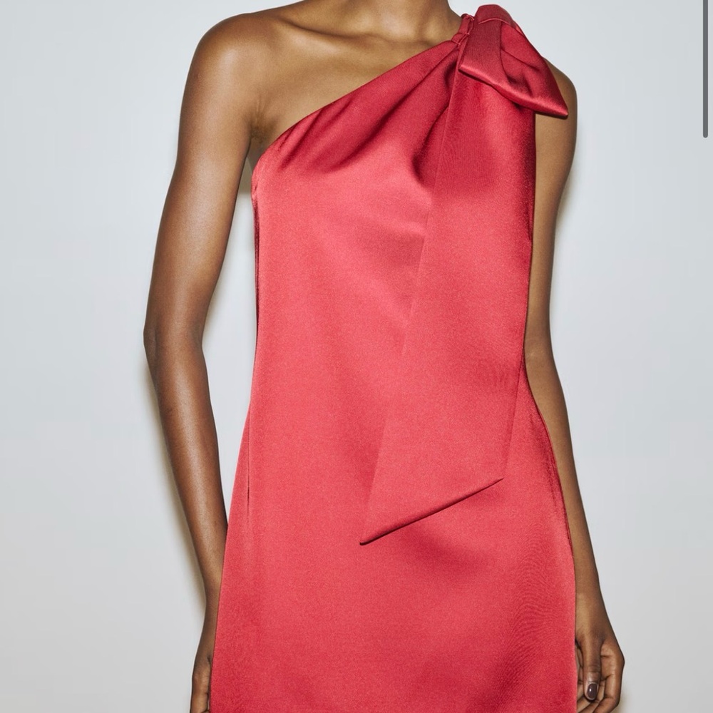 H&M mini dress with one shoulder bow! Tag says L but altered to fit XS/S.